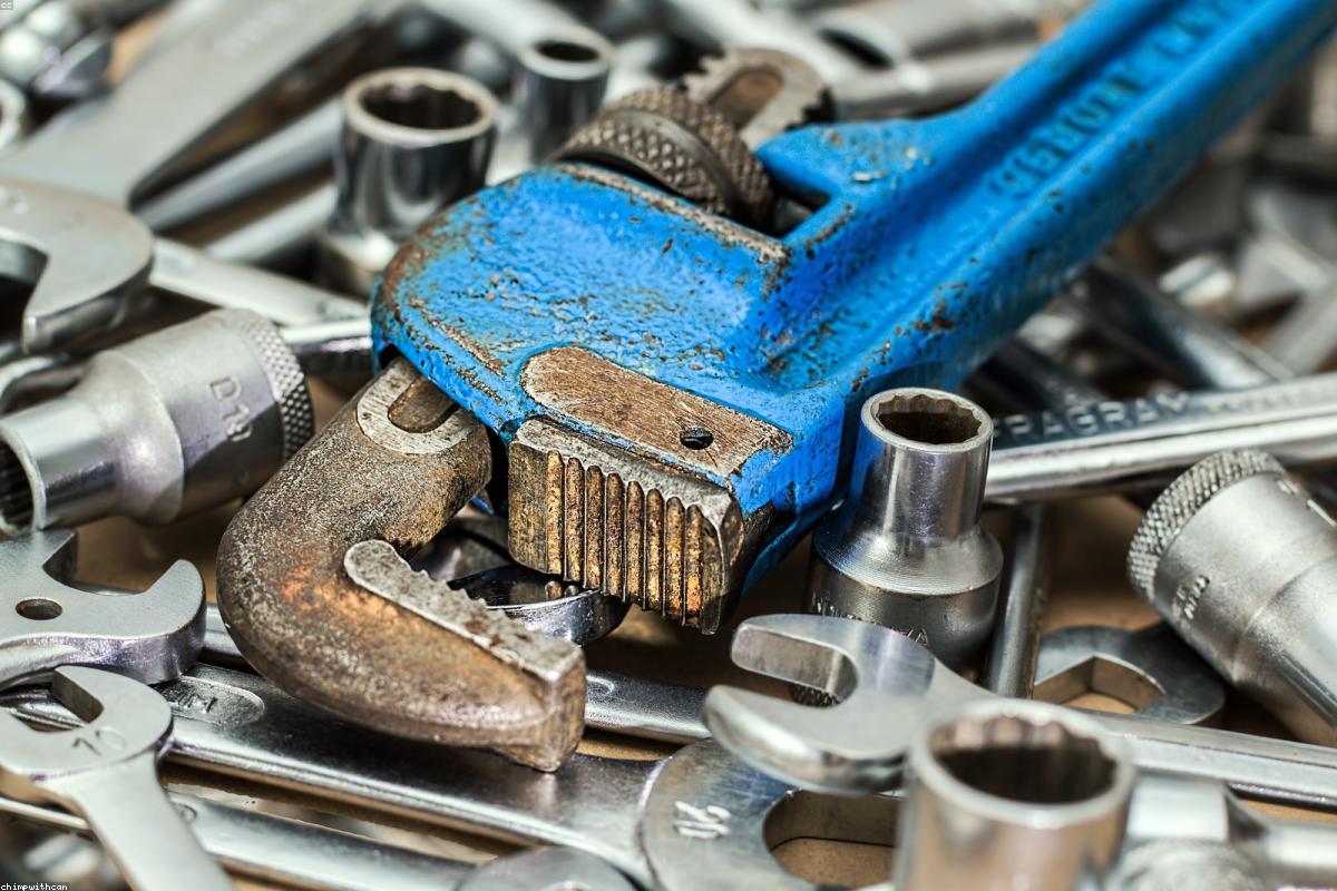 Tools and wrench representing plugin maintenance